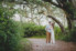 couple kissing during their engagement session at big talbot island
