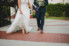 bride and groom walking and holding hands