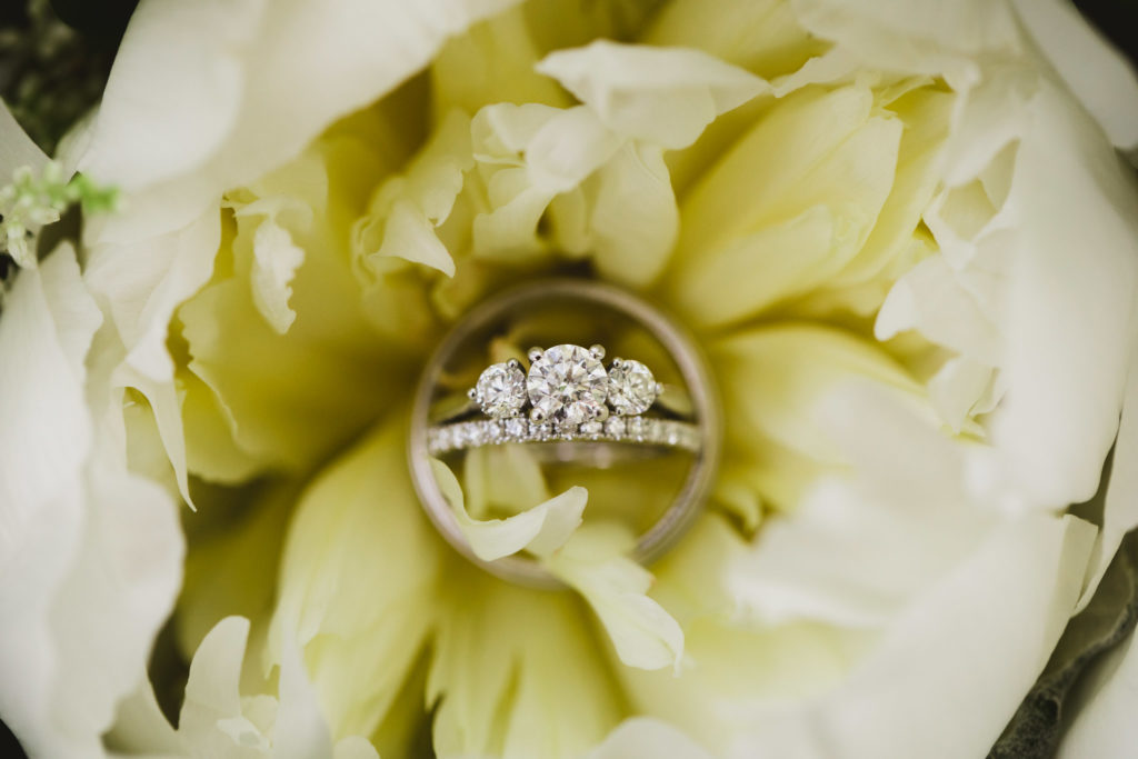 wedding rings in flower