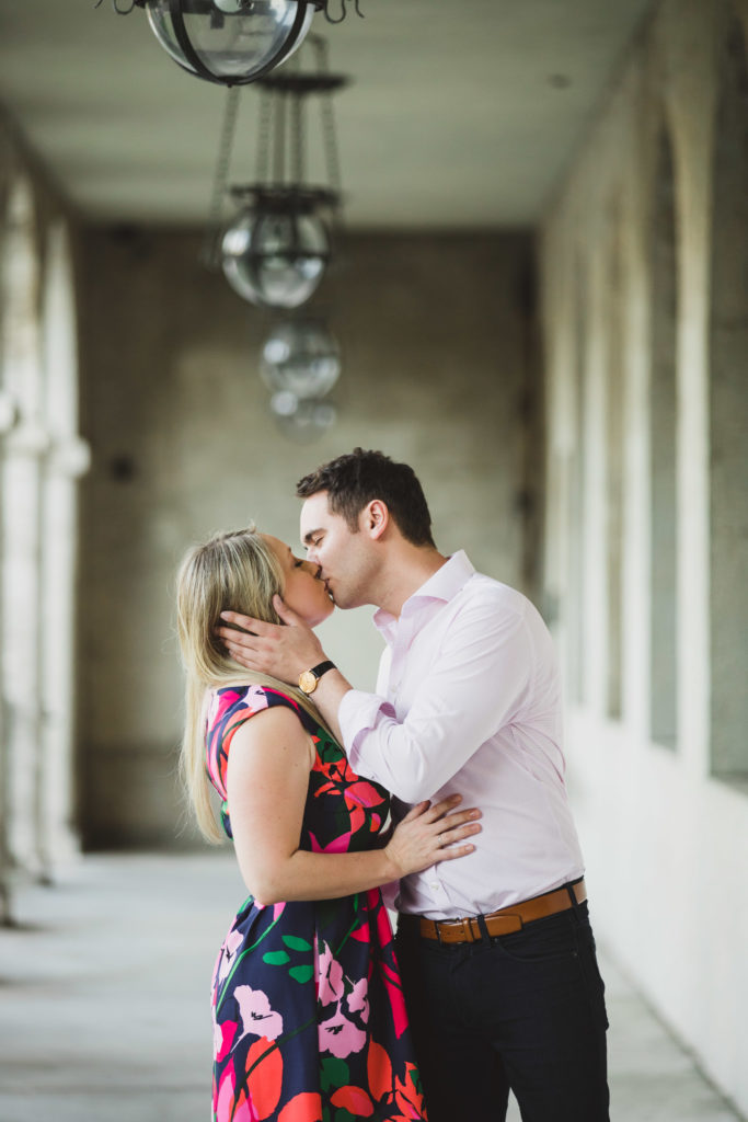 couple kissing in lightner museum walkway