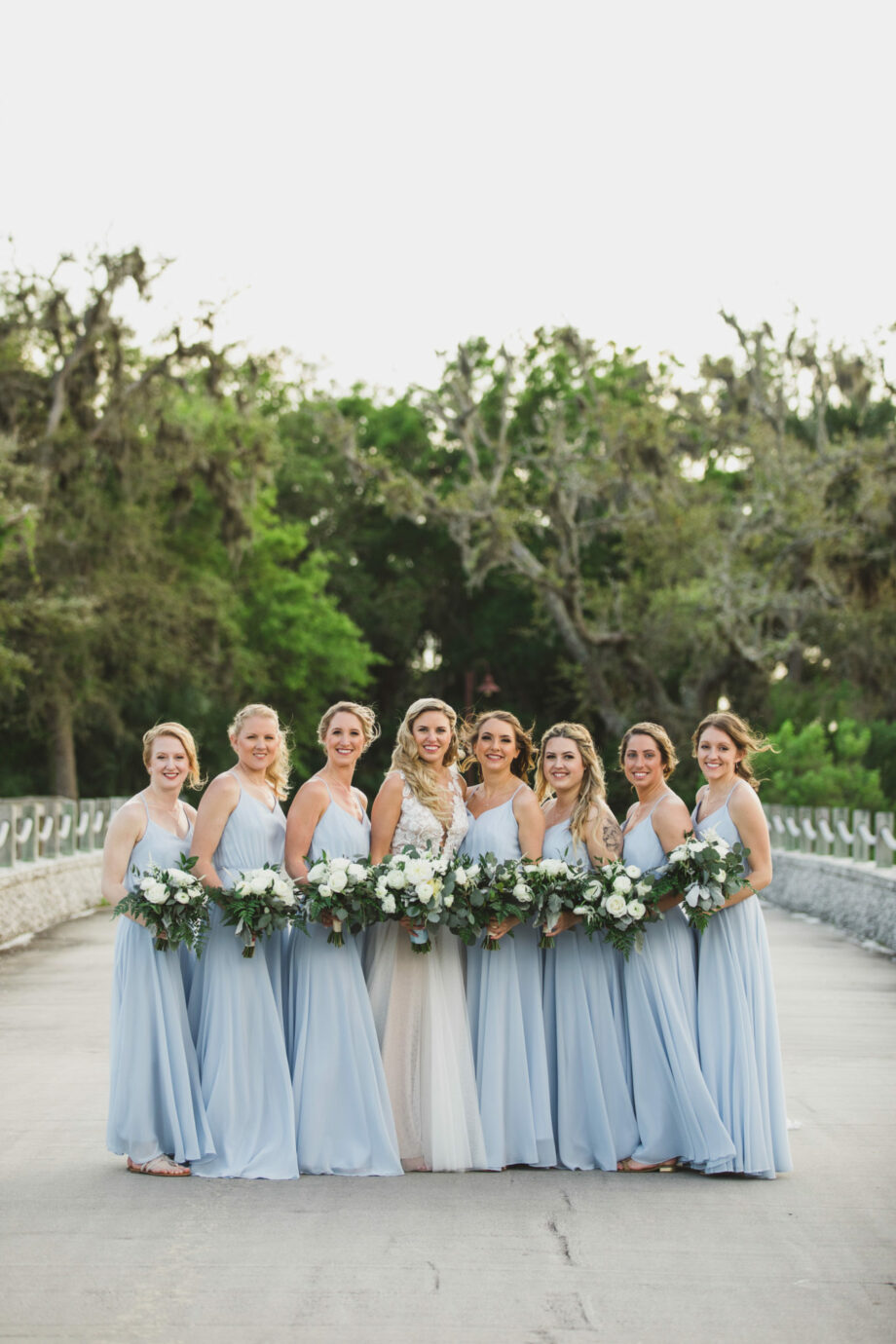 bride and bridesmaids at oyster bay yacht club wedding venue