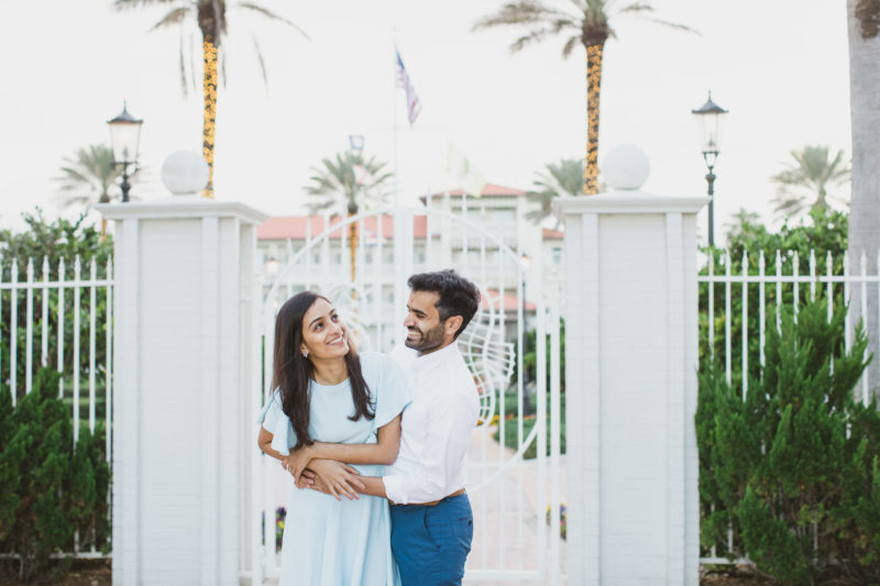 man hugging woman while laughing in front of ponte vedra inn and club