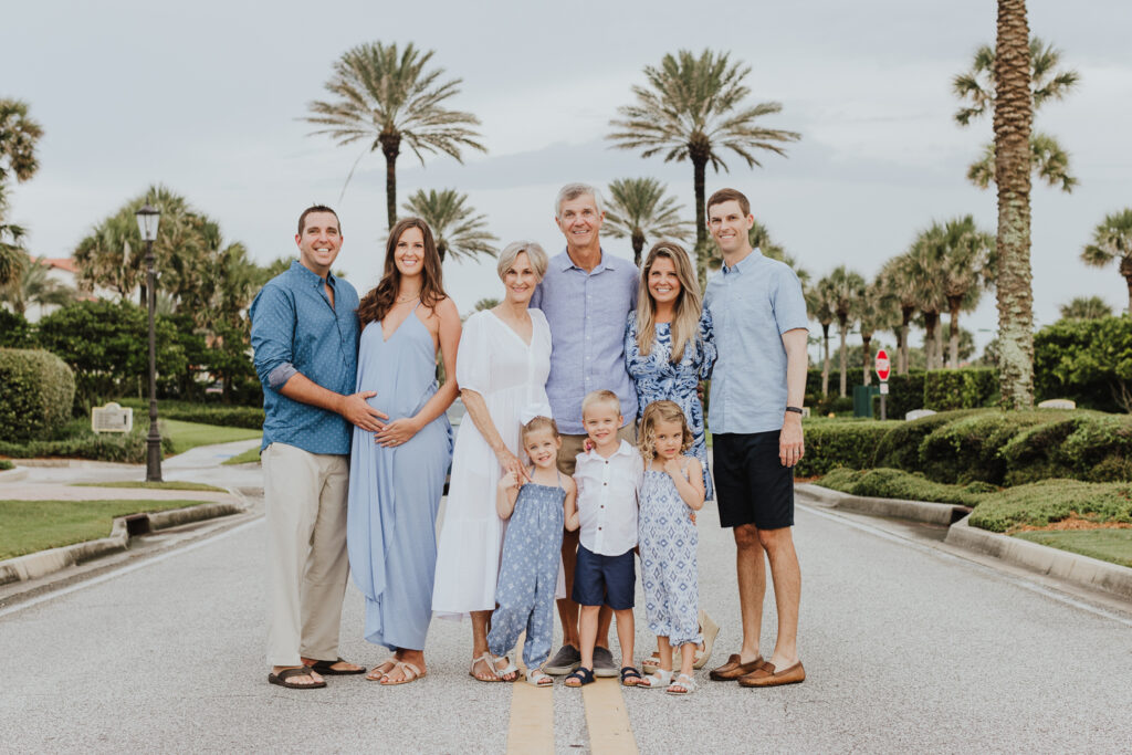 family portrait in ponte vedra with palm trees in the background