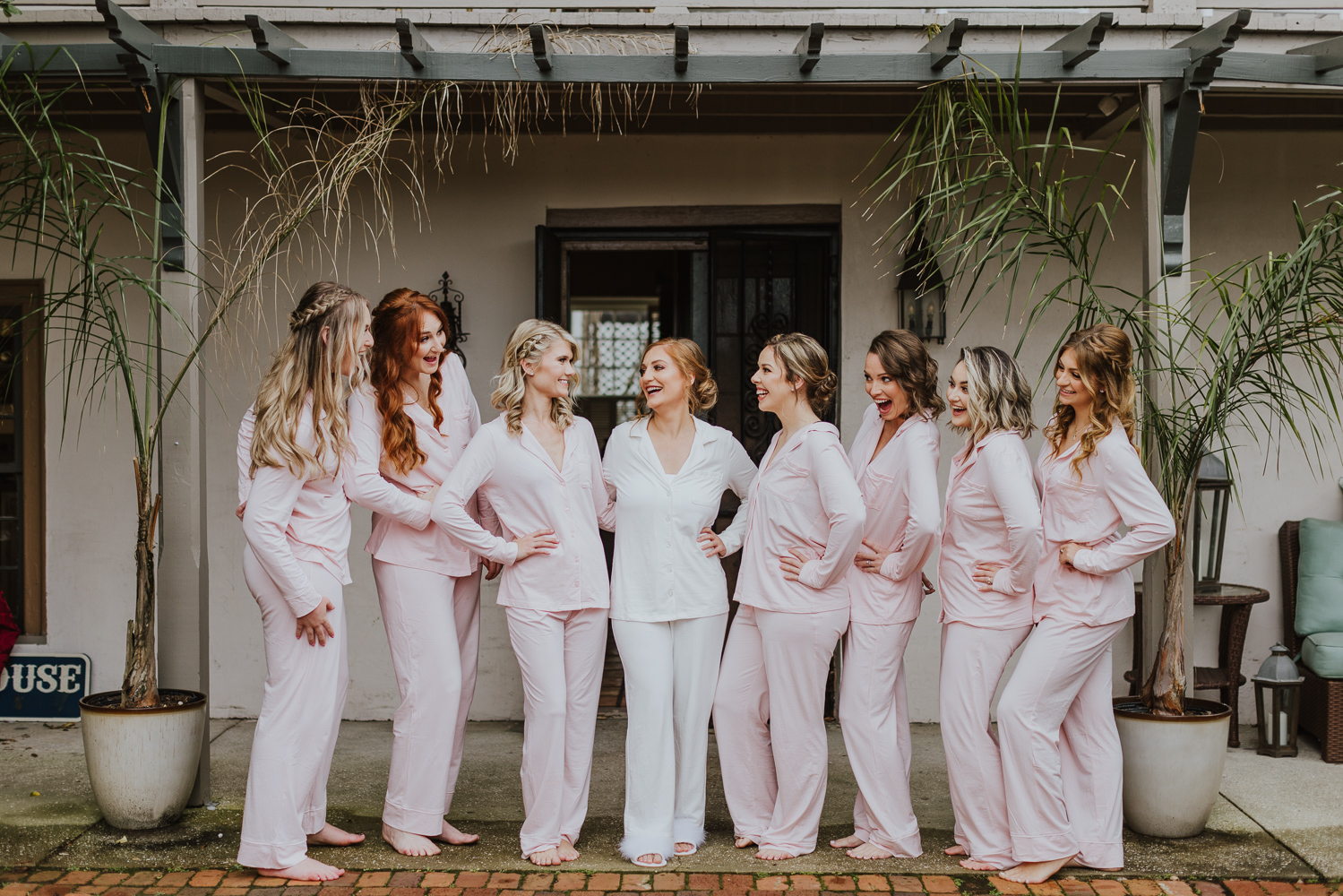 bride with her bridesmaids in their matching pajamas