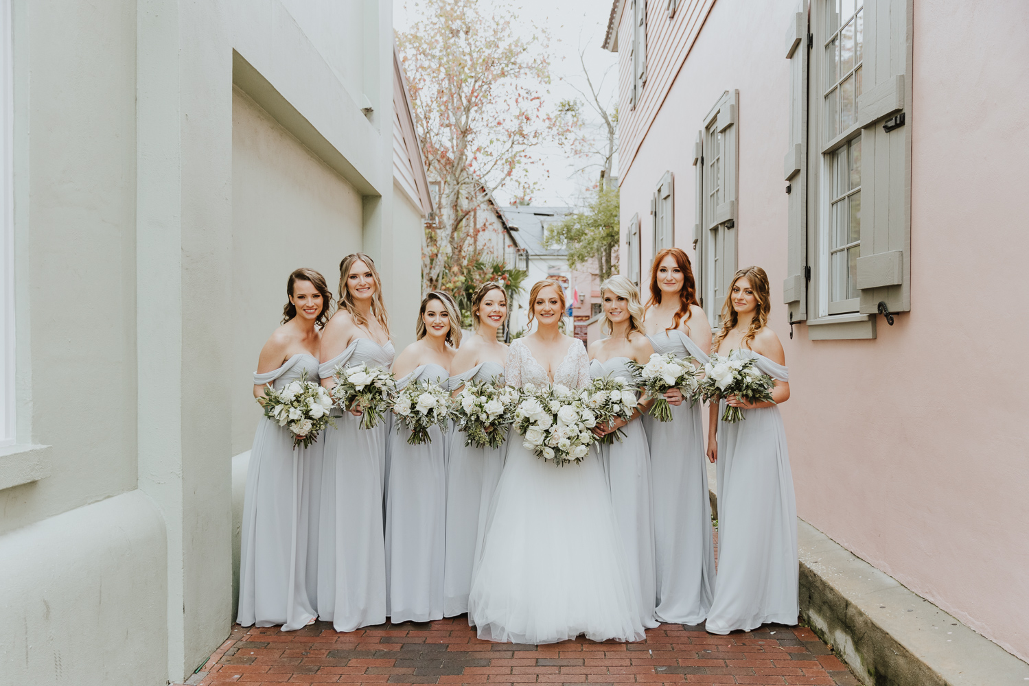 bride with bridesmaids in downtown st. augustine streets