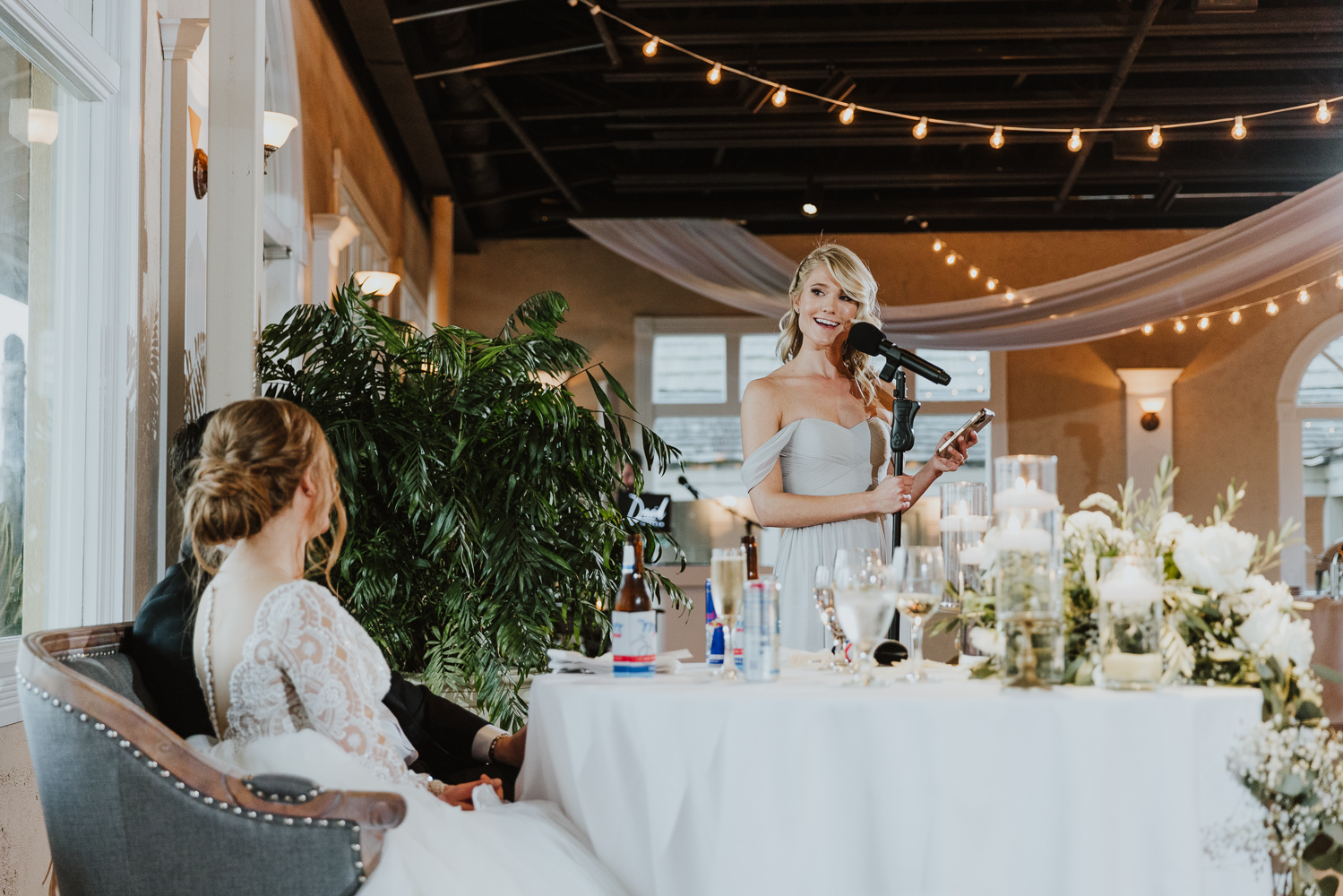 bridesmaid giving wedding speech during wedding reception at the white room 