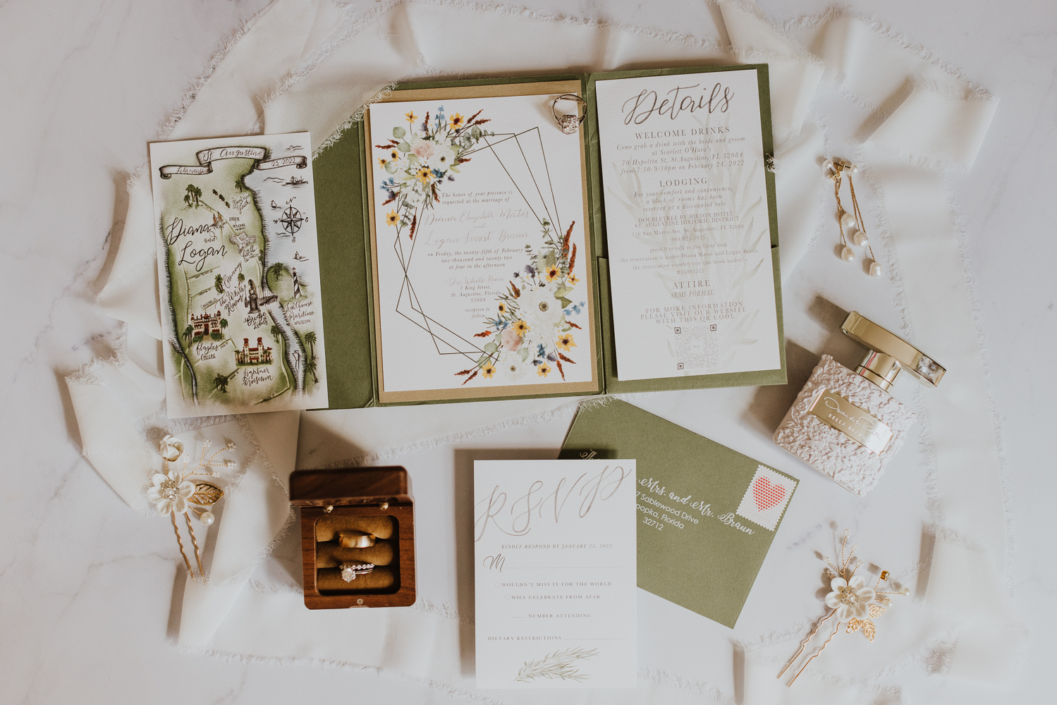 stunning floral and geometric wedding invitations arranged with bridal details 