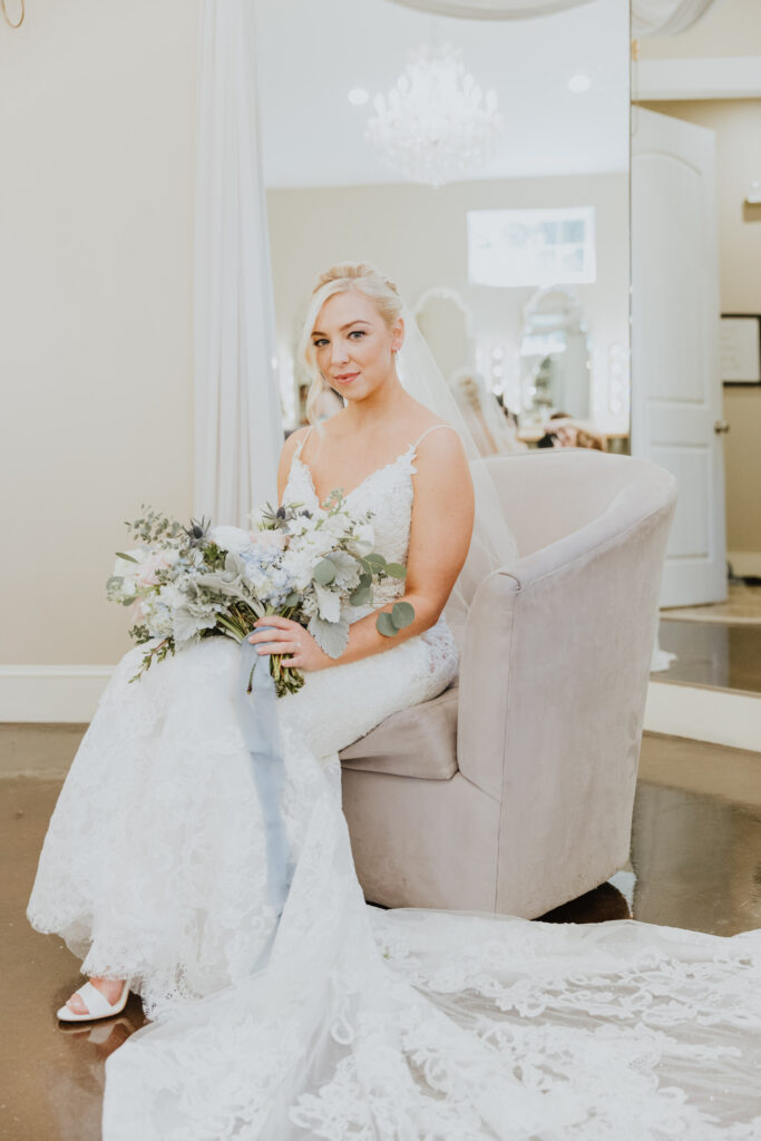 bride sitting in the bowing oaks bridal suite for portrait