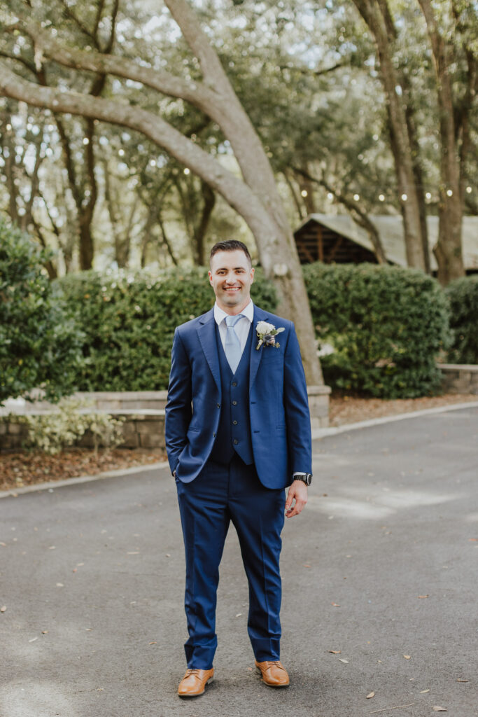groom portrait outside of bowing oaks before wedding ceremony