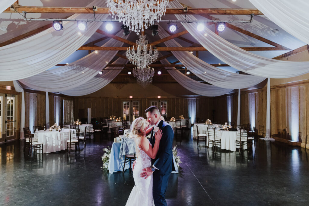 bride and groom sharing their private last dance at bowing oaks wedding venue 