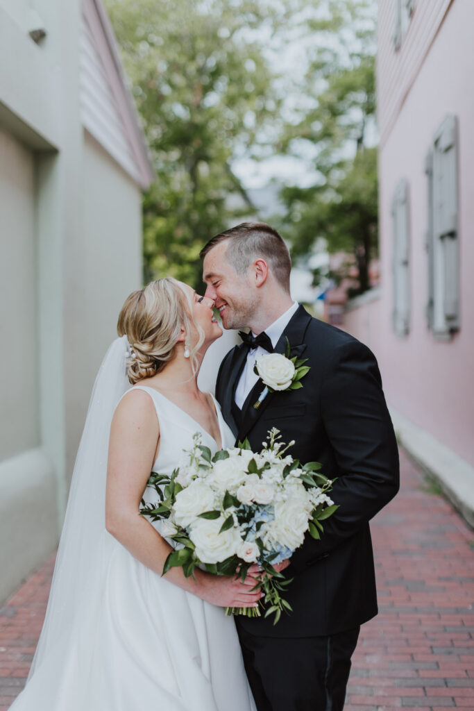 bride and groom about to kiss during coupes portraits in st. augustine 