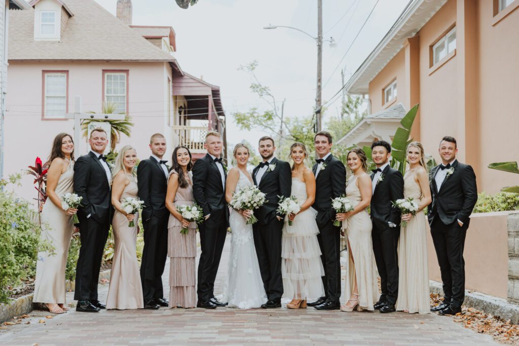 wedding party standing all together in downtown st. augustine